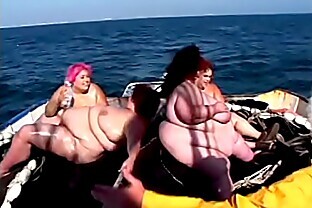 Four dirty BBW lifeguards fuck each other on the deck with toys on the boat poster