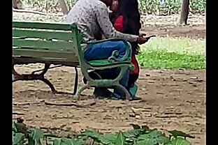 Beautiful Indian teen kissing in lodhi garden poster