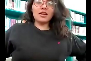 Beautiful College girl with nerd glasses flashing the most perfect tits in her schools library poster