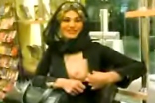 tits showing in shop woman iranian poster