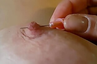 Pushing a needle through my nipple