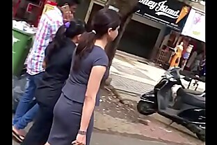 Cute Indian Ass in tight skirt poster