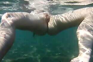 Cute Nastya is showing her beautyful body underwater poster