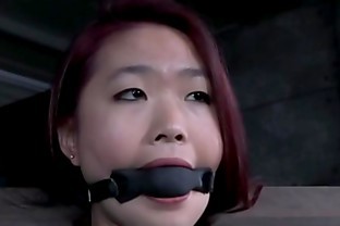 Redhead asian sub with mouth gag dominated