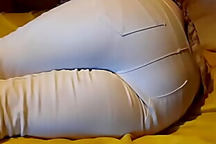 Bed wetting in pee stained white jeans