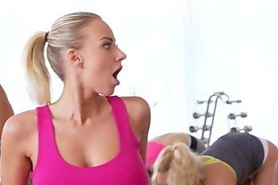 Muscled fitness coach bangs two babes in the gym poster