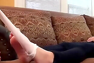 Woman Barefeet Taking off her Sneakers and Socks Feet Worship