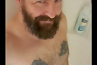 Anthony Arden stroking in the shower