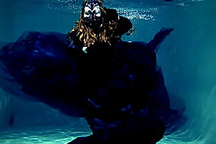 underwater in swimming pool Arya Grander