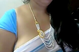 Indian aunty with big boobs on webcam exposed poster