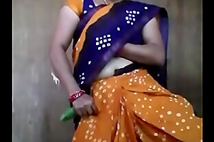 indian lady is using cucumber inside her vagina pussy