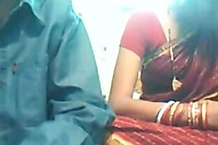 Indian young couple on web cam poster