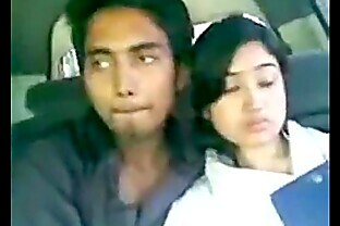 Indian Boy kissing Girlfriend in car