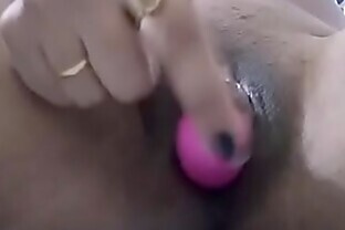Indian girl using vibrator in her big lip pussy