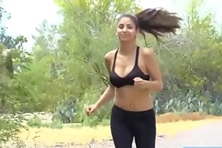 Amazing brunette busty teen amateur Nina fucks her juicy pussy with a large banana in the middle of the street