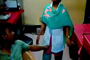technician finguring lady nurse in hospital