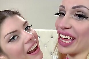 Chessie Kay and Lucia Love asslick and gag with old Ben Dover poster