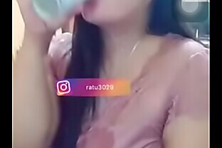 Desi spitting milk on boobs poster